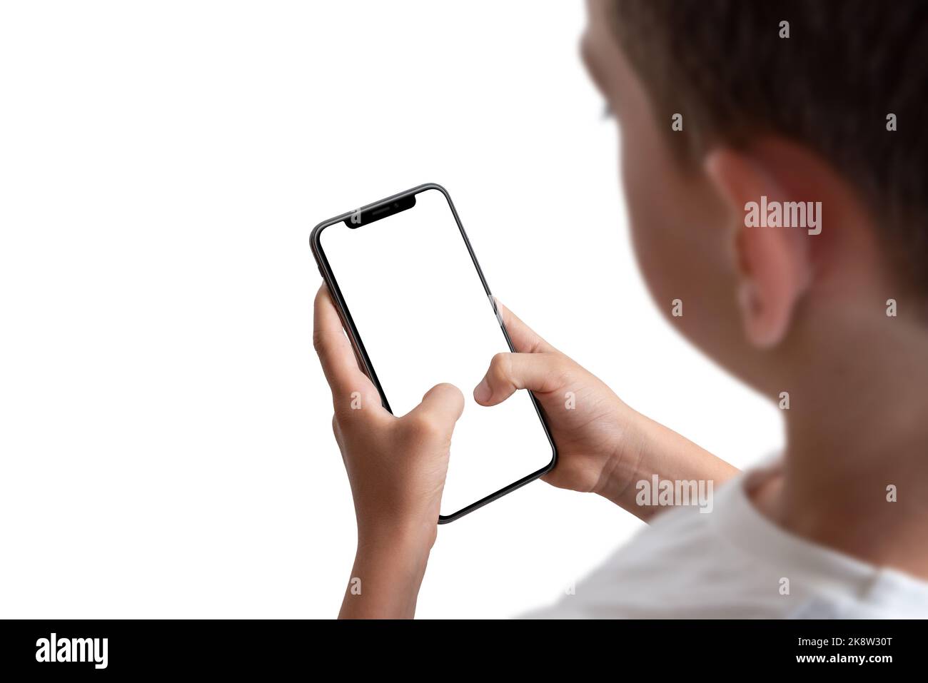 Boy holding smart phone with isolated display and background Stock Photo