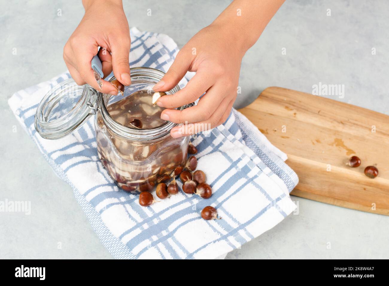 Preparing chestnut liquid soap, cutting buckeye and putting it into a