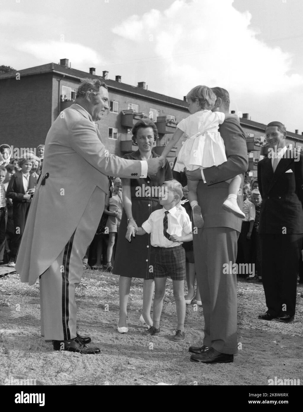 Oslo 19600903. The entire Norwegian Circus Director Arnardo invited Princess Ragnhild and her family to one of her performances in Oslo. Here on the way into the circus tent where circus director Arnardo (t.v.) greeted the royal princess Ragnhild her husband Erling Lorentzen, children Ingeborg and Haakon. Photo: Ivar Aaserud Current / NTB Stock Photo