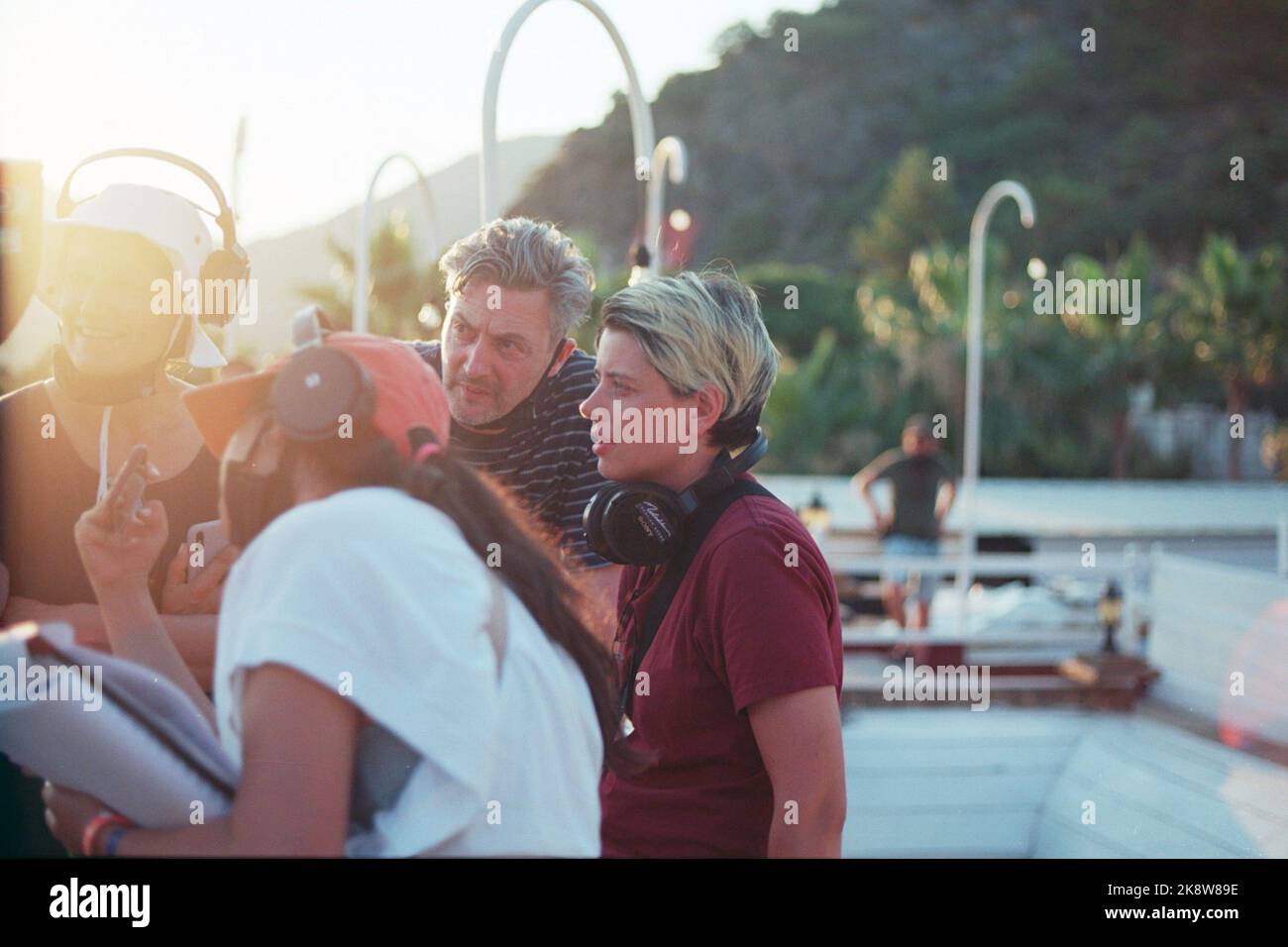 AFTERSUN, director Charlotte Wells (center of frame), on set, 2022