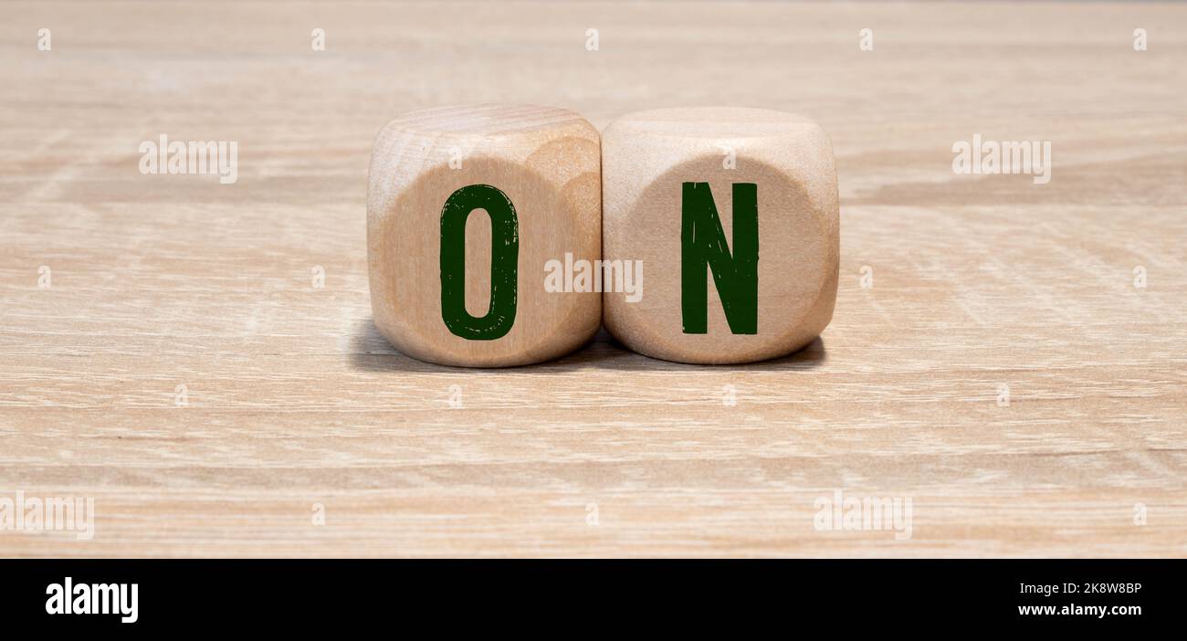 Faded glow mode shooting photo of square wooden blocks crossword with Faded glow mode shooting photo of square wooden blocks crossword with