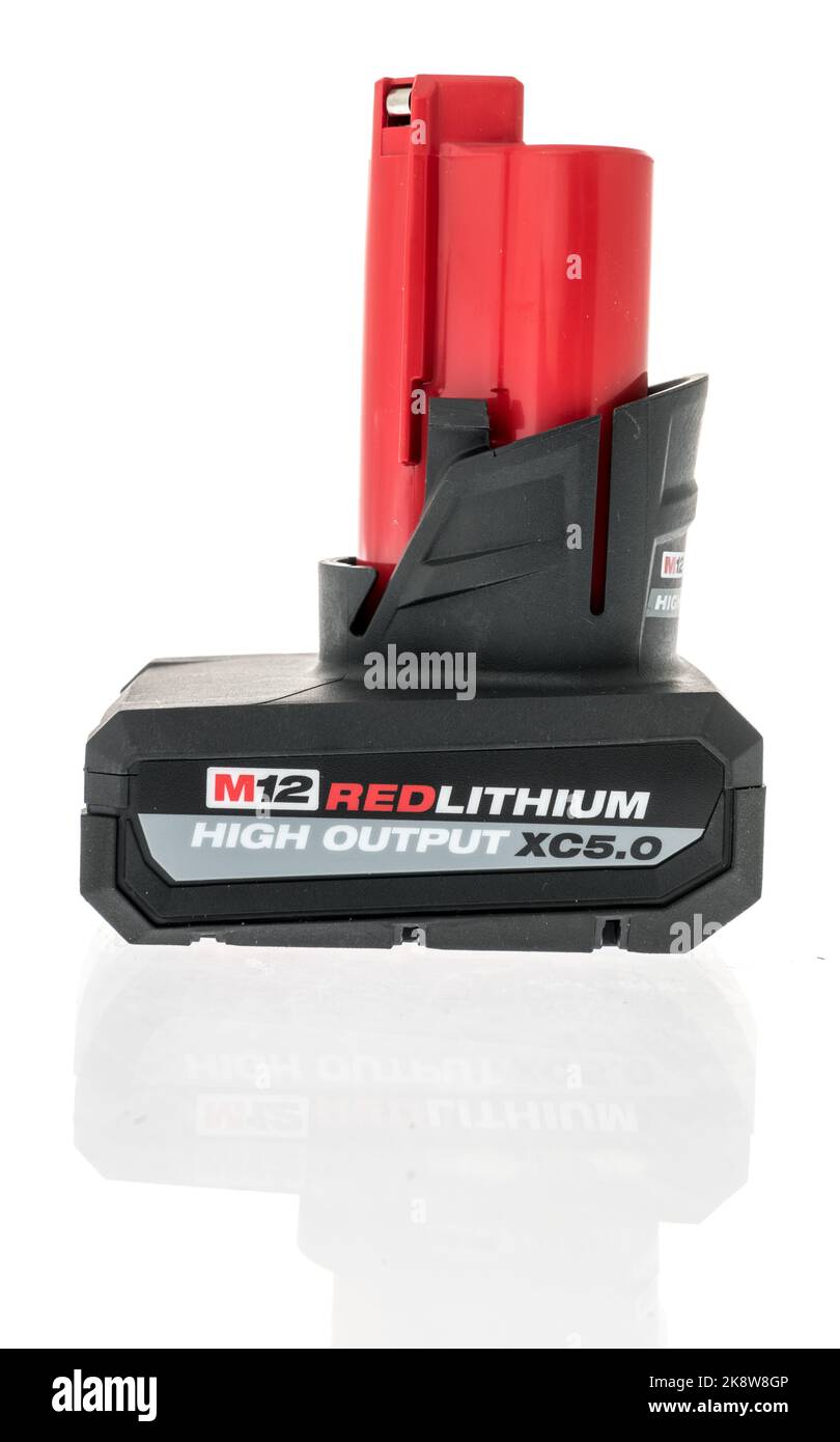 Winneconne, WI - 26 September 2022: A package of Milwaukee fuel M12 red lithium high output xc 5.0 battery on an isolated background. Stock Photo