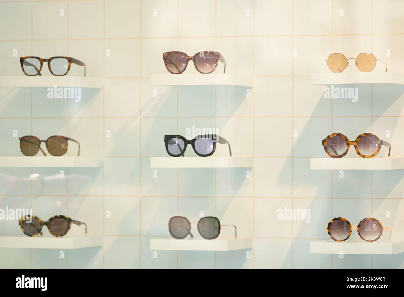Glasses shown on wall optical hi-res stock photography and images - Alamy