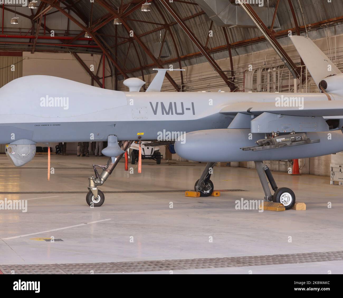 The MQ-9A Reaper with Marine Unmanned Aerial Vehicle Squadron (VMU) 1, 3rd Marine Aircraft Wing, is prepared for disassembly inside a hangar at Marine Corps Air Station (MCAS) Yuma, Arizona, Sept. 13, 2022. The disassembly, transport, and reassembly of the platform between MCAS Yuma and MCAS Miramar via a U.S. Marine Corps KC-130J Hercules aircraft served as a proof of concept for the Reaper's rapid, expeditionary deployment capacity. (U.S. Marine Corps photo by Lance Cpl. Jade Venegas) Stock Photo