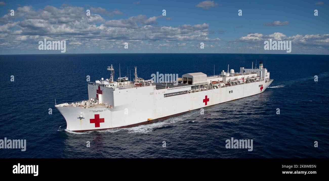 221021-N-MY642-1012  ATLANTIC OCEAN (October 21, 2022) The hospital ship USNS Comfort (T-AH 20) steams through the ocean as part of the transit south from Nofolk, Va. Comfort is deployed to U.S. 4th Fleet in support of Continuing Promise 2022, a humanitarian assistance and goodwill mission conducting direct medical care, expeditionary veterinary care, and subject matter expert exchanges with five partner nations in the Caribbean, Central and South America. (U.S. Navy photo by Mass Communication Specialist 1st Class Donald R. White Jr.) Stock Photo