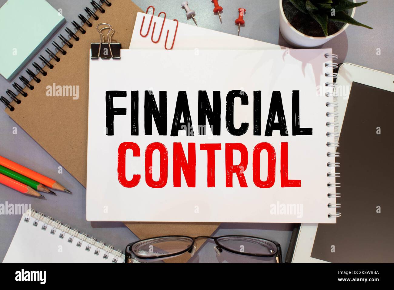 Financial Tips - written text in a notebook on white background with ...