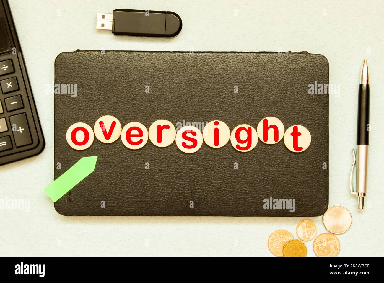 text Oversight on wooden block Stock Photo
