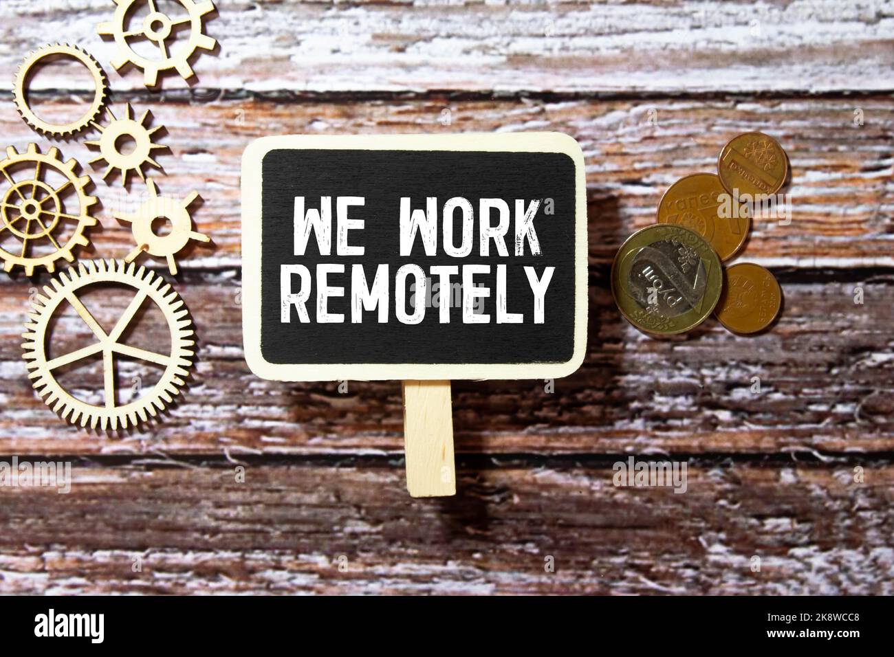 Work From Home, text in notepad with part of communication work tools