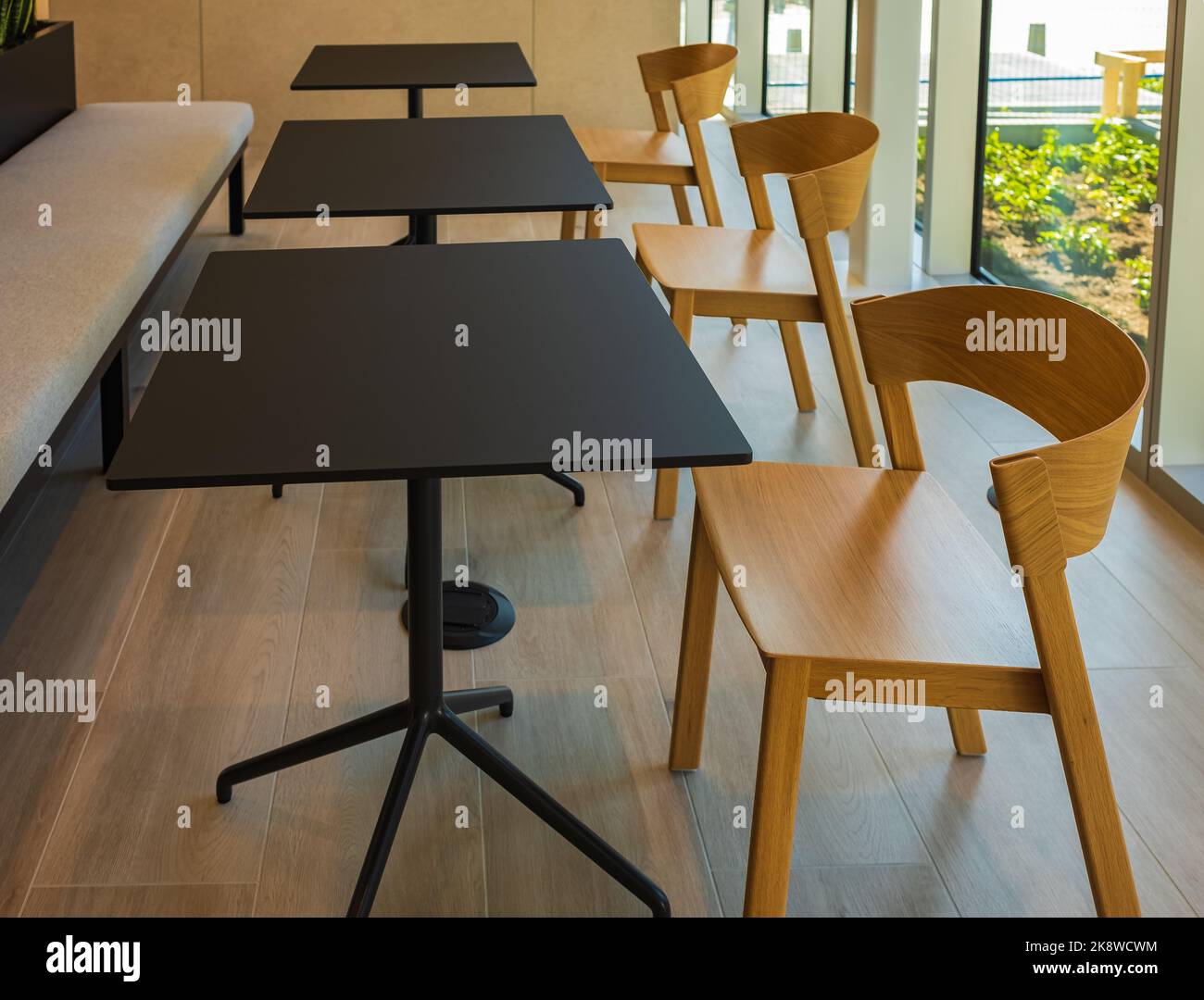 Empty modern classroom or training room with chairs and tables. Conference table, chairs at lobby. Nobody, selective focus Stock Photo