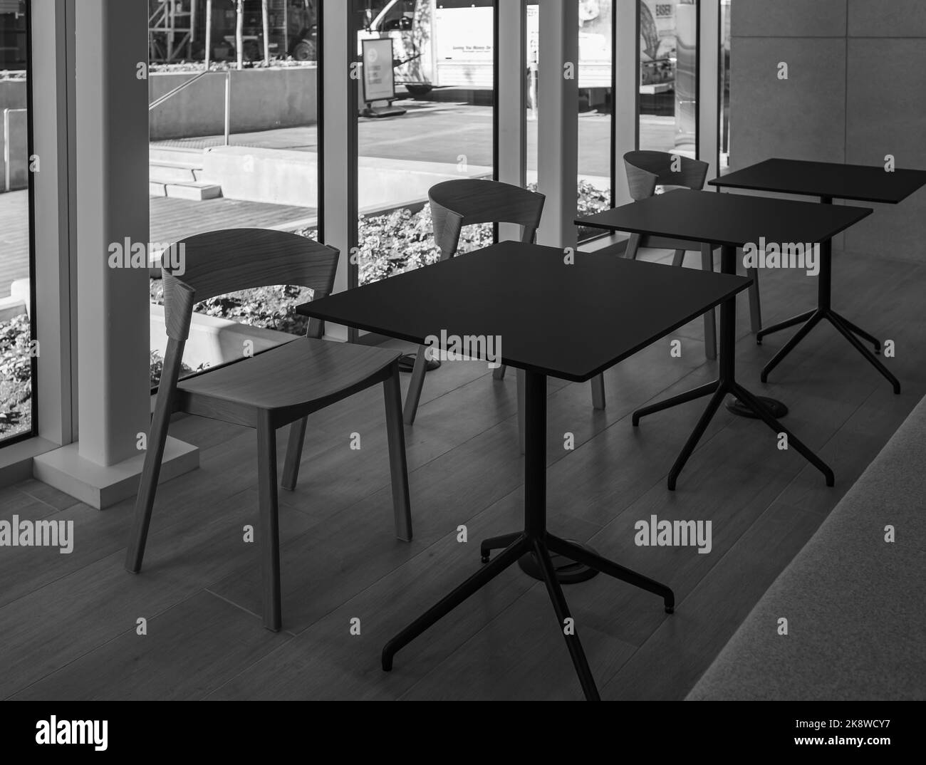 Empty modern classroom or training room with chairs and tables. Conference table, chairs at lobby. Nobody, selective focus Stock Photo