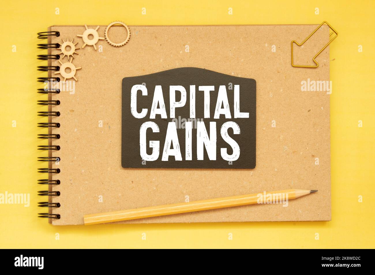 Text capital gain on the short note texture background Stock Photo - Alamy