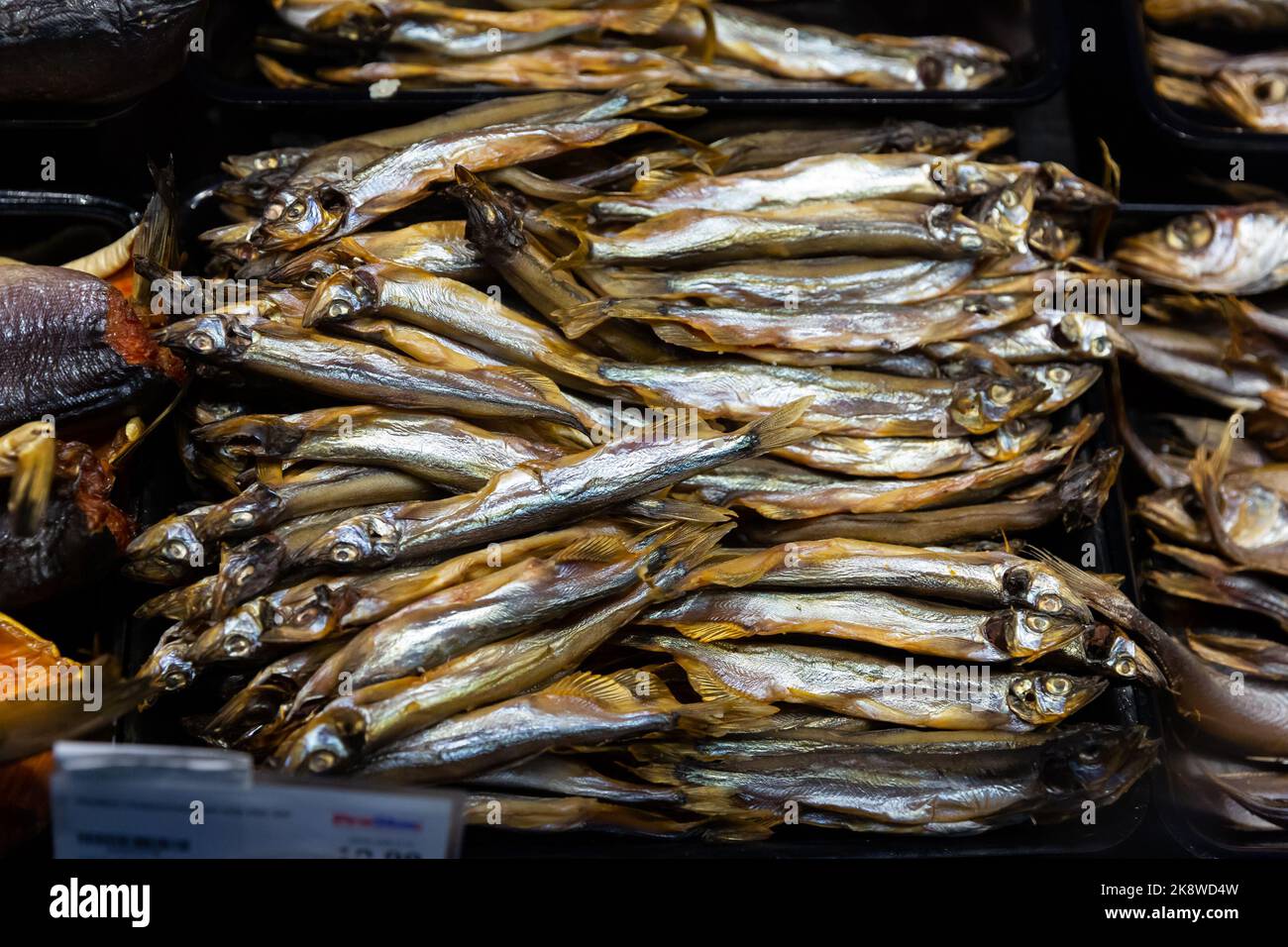 Cured herring and other fish in supermarket Stock Photo Alamy