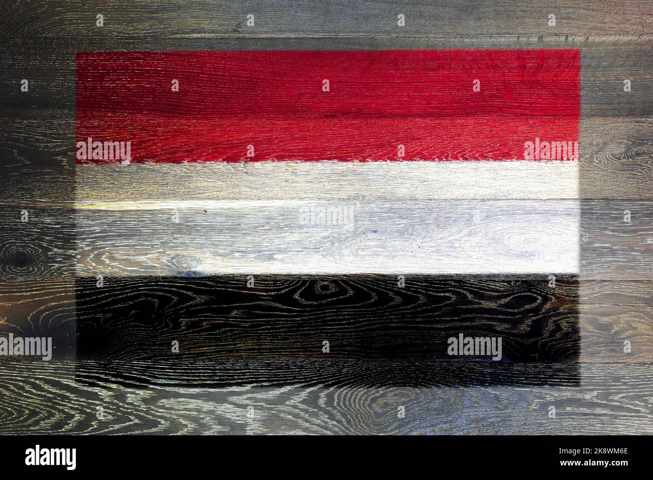 Yemen flag on rustic old wood surface background Stock Photo - Alamy