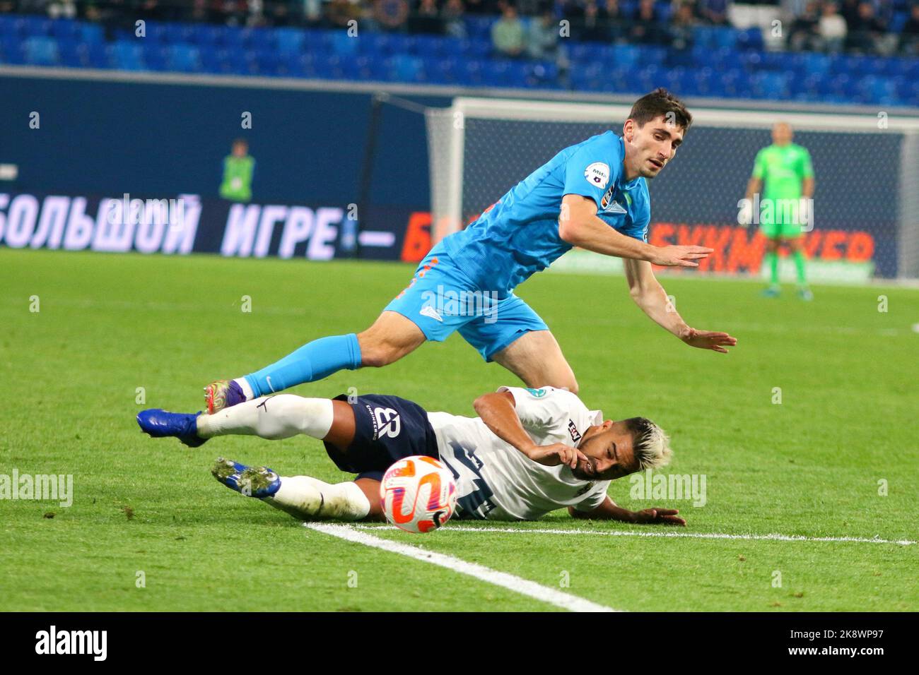 Saint Petersburg, Russia. 24th Oct, 2022. Zelimkhan Bakaev (Blue) of Zenit and Christian Noboa (White) of Sochi seen in action during the Russian Premier League football match between Zenit Saint Petersburg and Sochi at Gazprom Arena. Final score; Zenit 7:0 Sochi. Credit: SOPA Images Limited/Alamy Live News Stock Photo