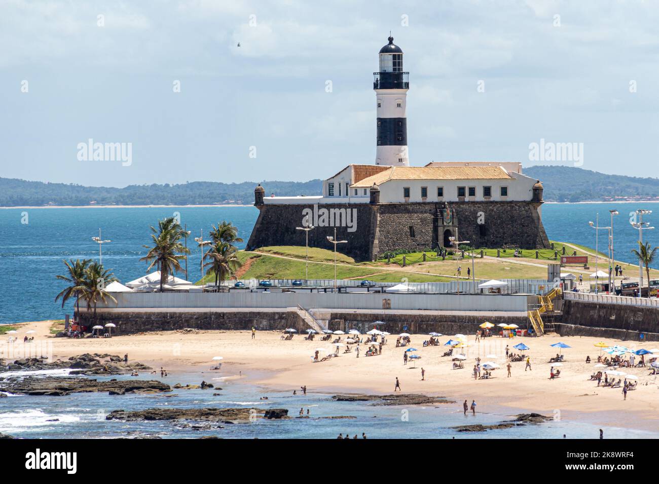 Farol da Barra Lighthouse at Salvador on a sunny summer day. Historic architecture of Salvador, Brazil Stock Photo