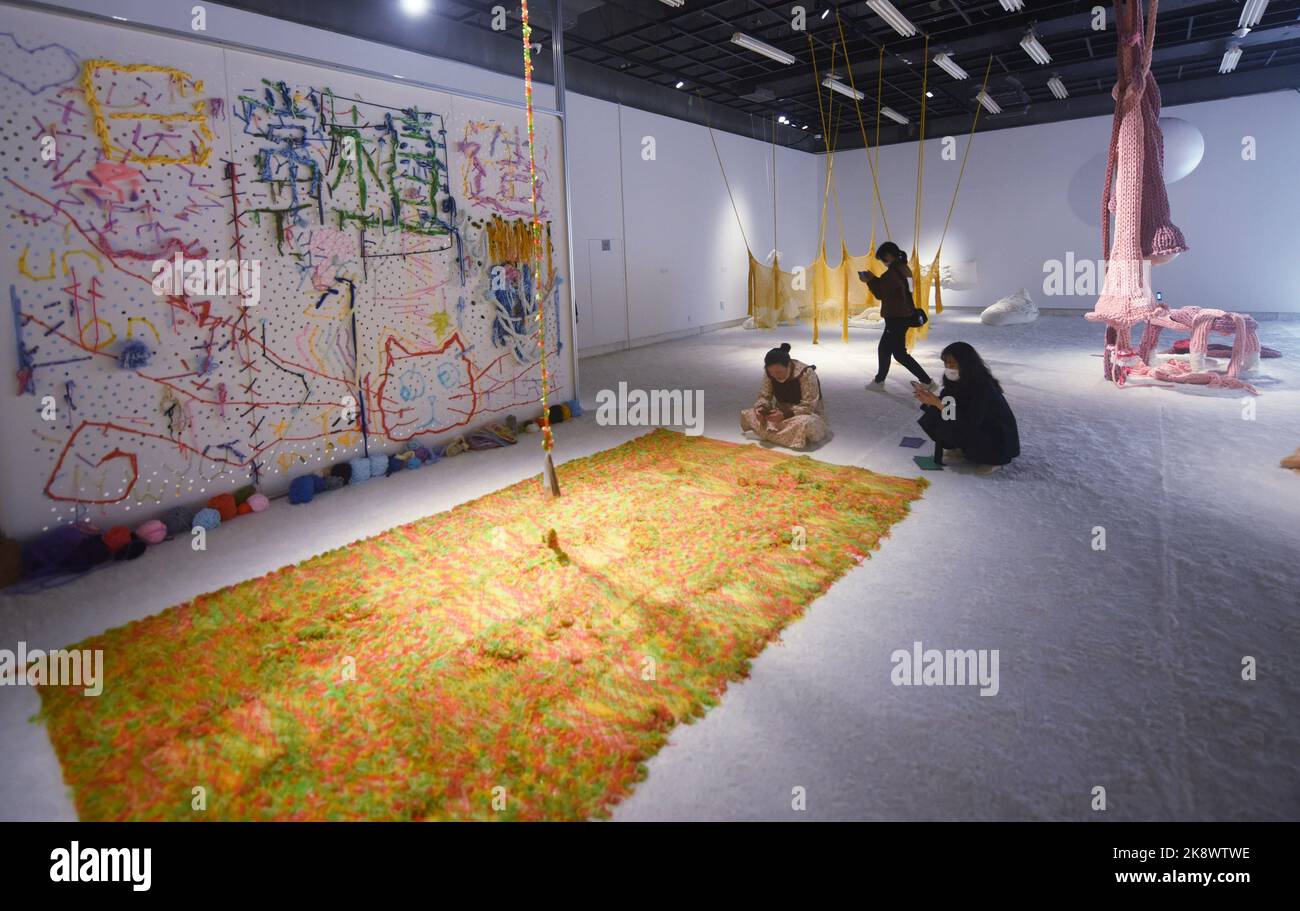 Recentl HANGZHOU, CHINA - OCTOBER 25, 2022 - Visitors view fiber art works at ...