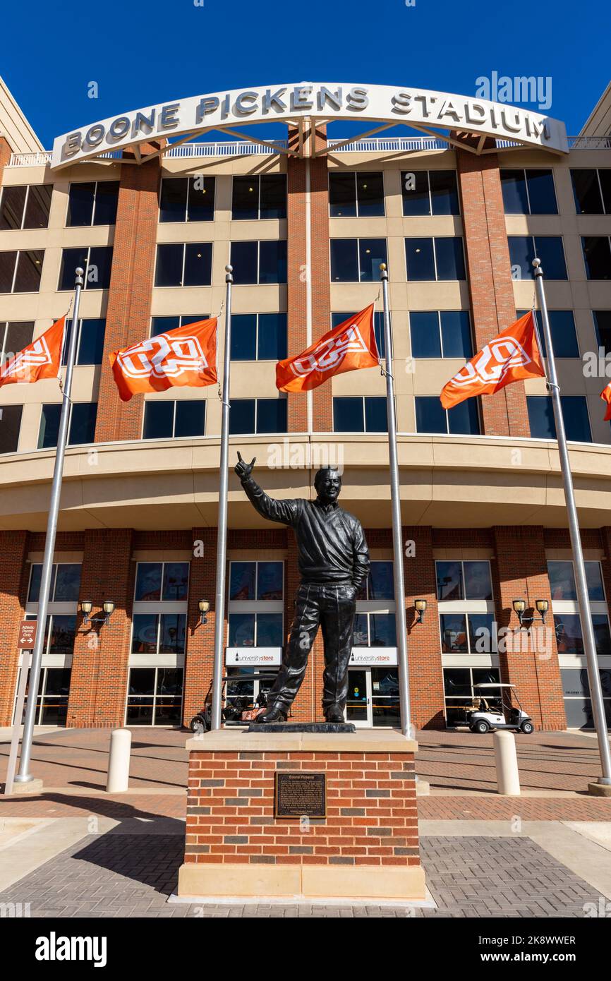 Stillwater, OK - October 21, 2022: Boone Pickens statue in front of Boone Pickens Stadium, home of Oklahoma State University Football Stock Photo