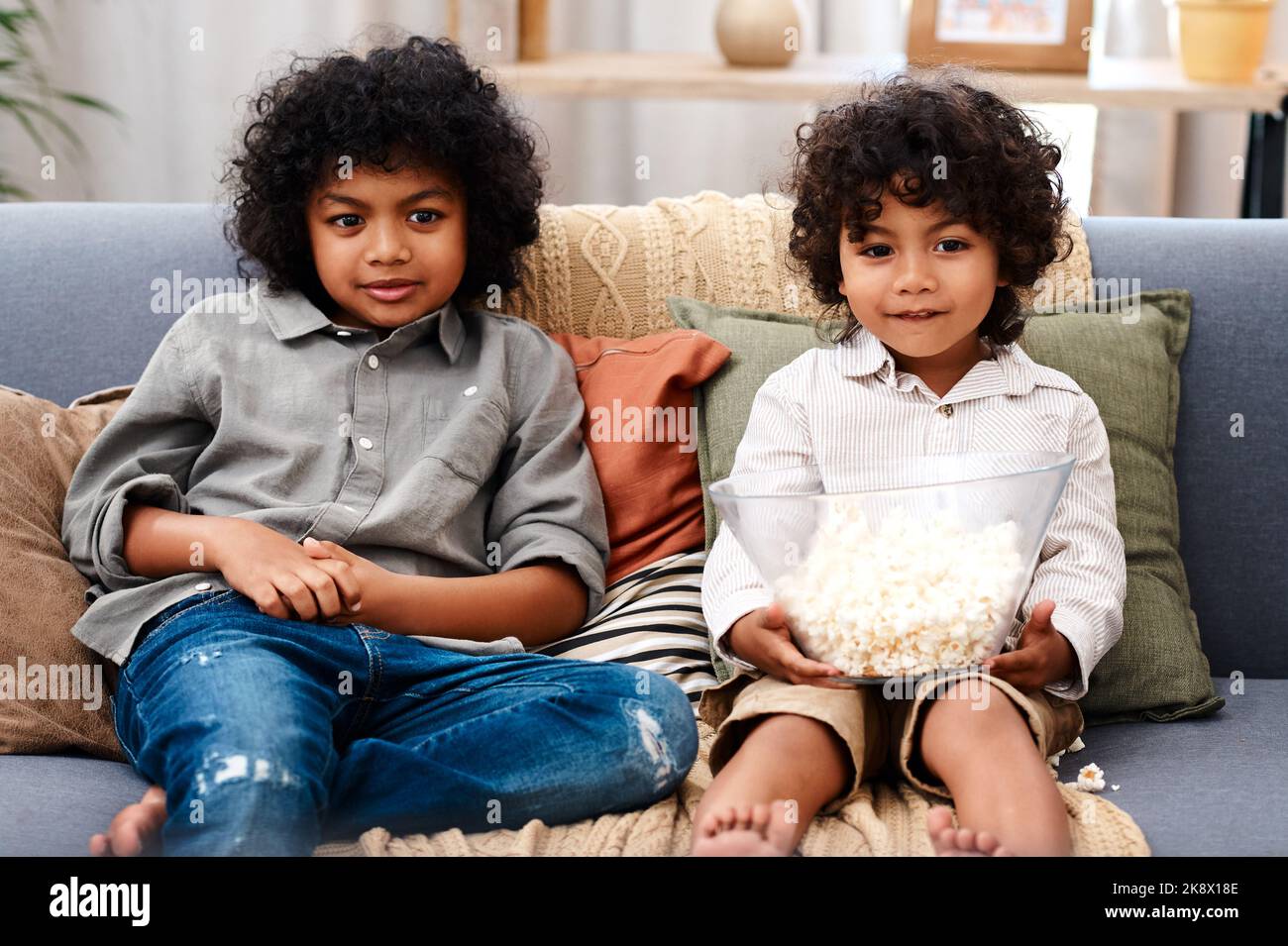 A brother is your first best friend. two adorable little boys eating