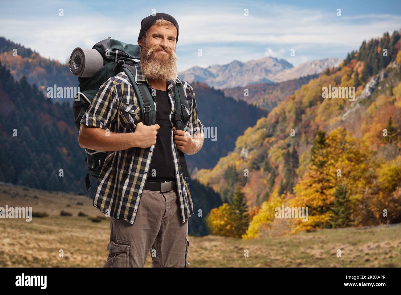 Young male hiker smiling hi-res stock photography and images - Alamy