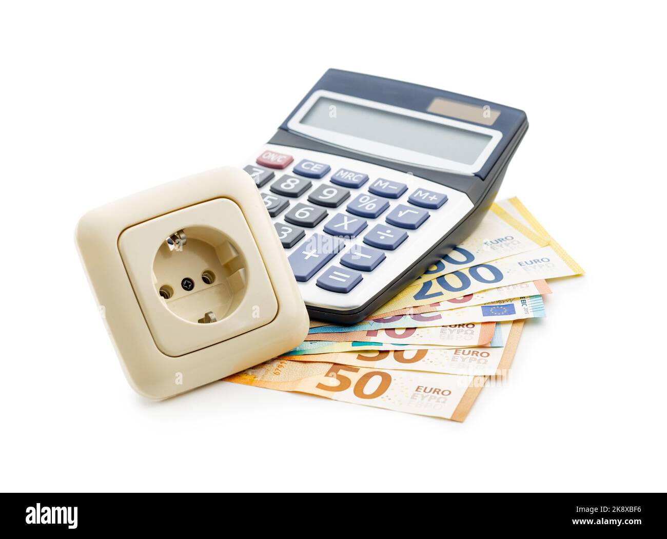 The energy savings concept with electric power socket, calculator and euro money isolated on the white background. Stock Photo