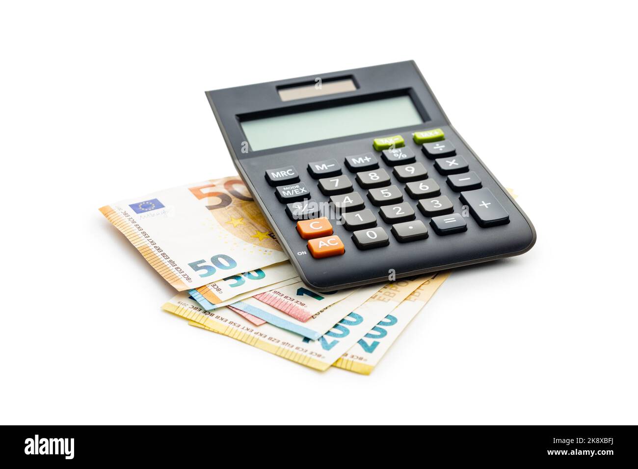 Calculator and euro paper banknotes money isolated on the white background. Stock Photo