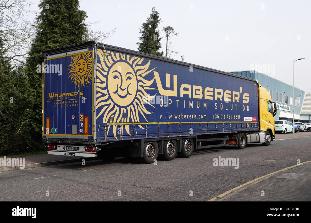 A Waberers Optimum Solution truck parked in a road on an industrial estate Stock Photo