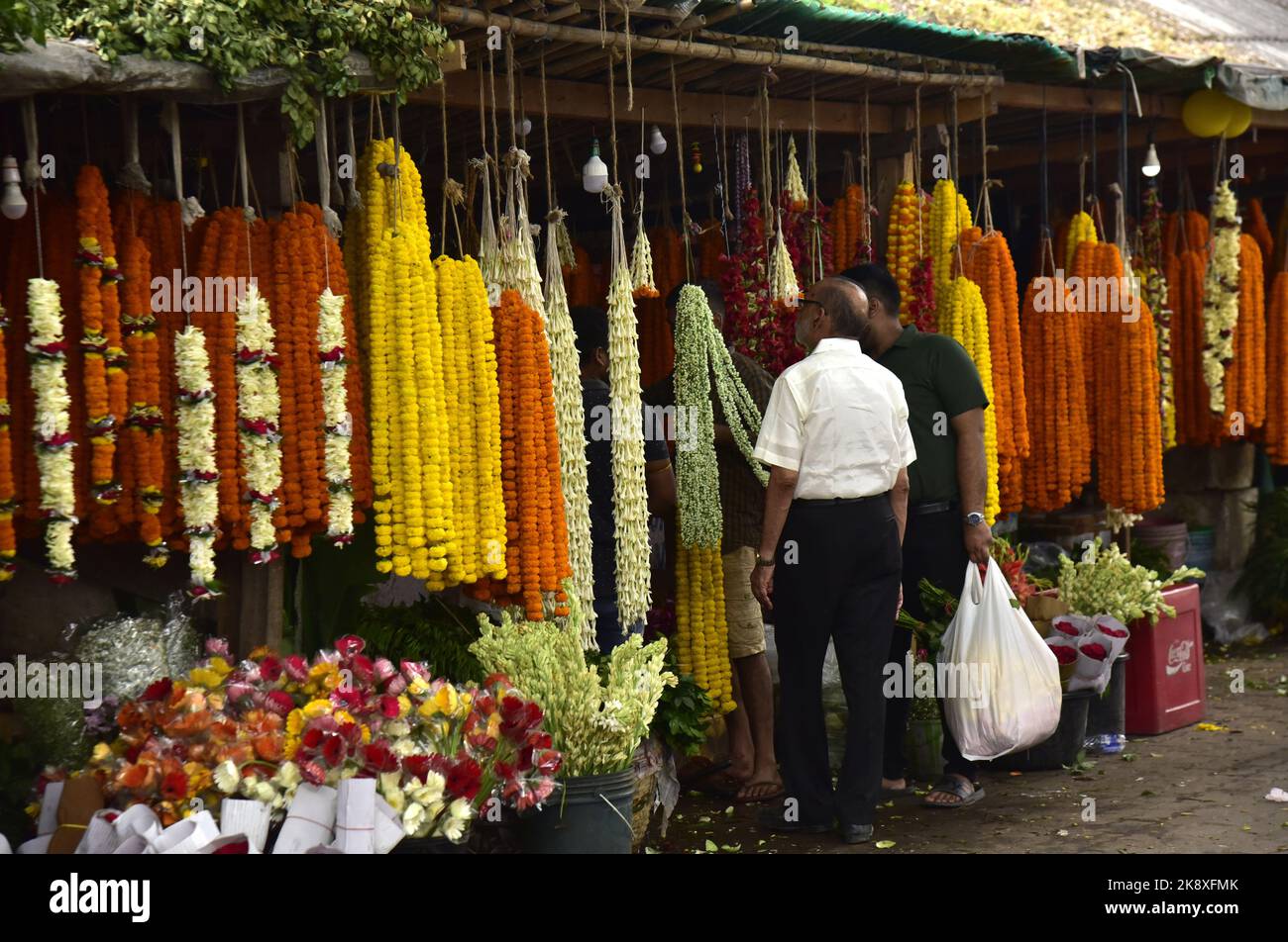 Guwahati, Guwahati, India. 24th Oct, 2022. People buys flowers on the