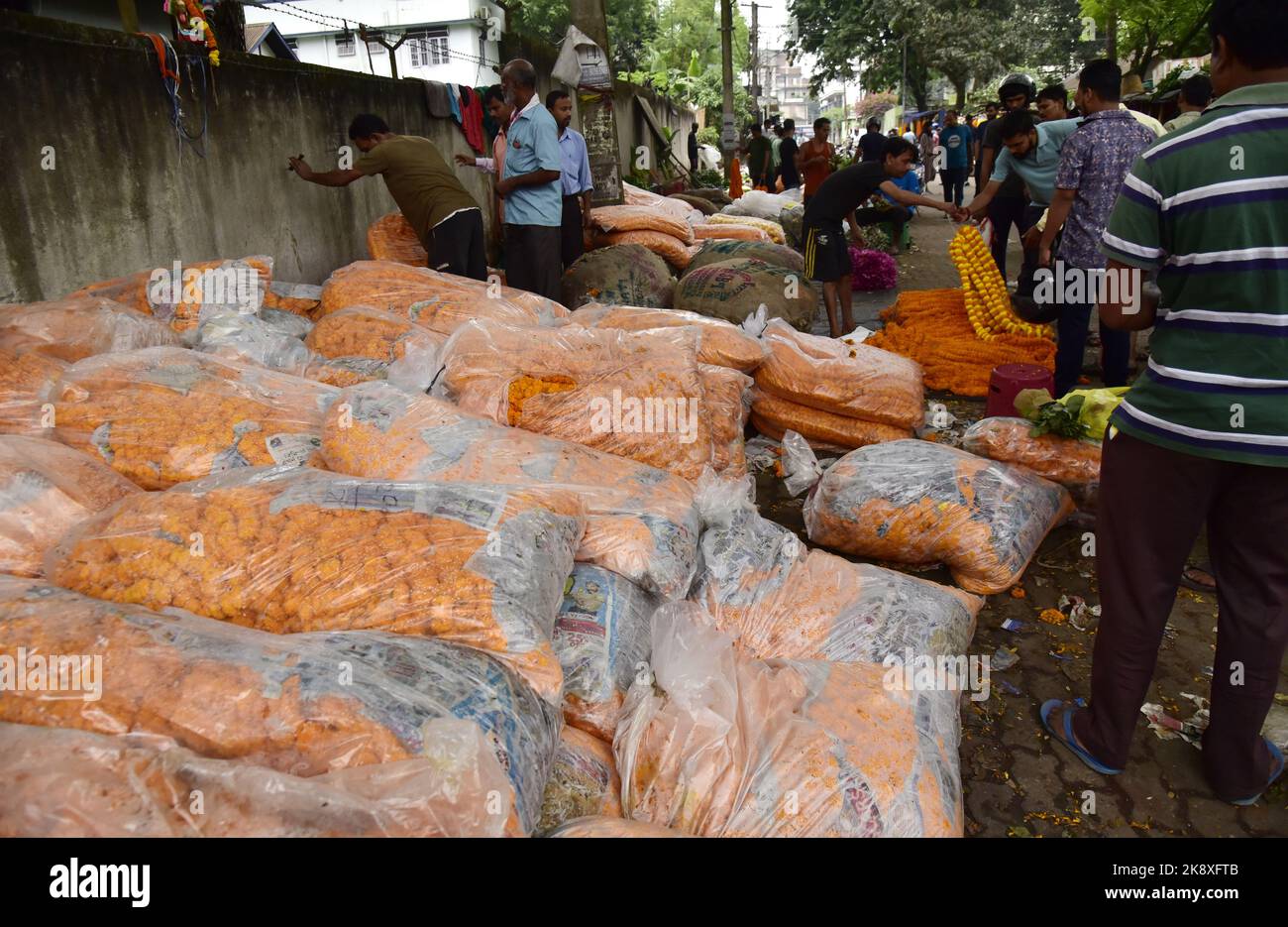 Guwahati, Guwahati, India. 24th Oct, 2022. People buys flowers on the