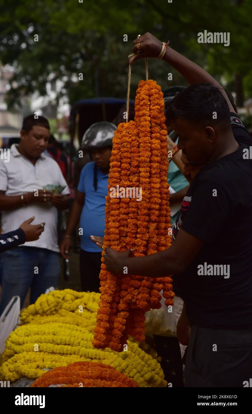 Guwahati, Guwahati, India. 24th Oct, 2022. People buys flowers on the