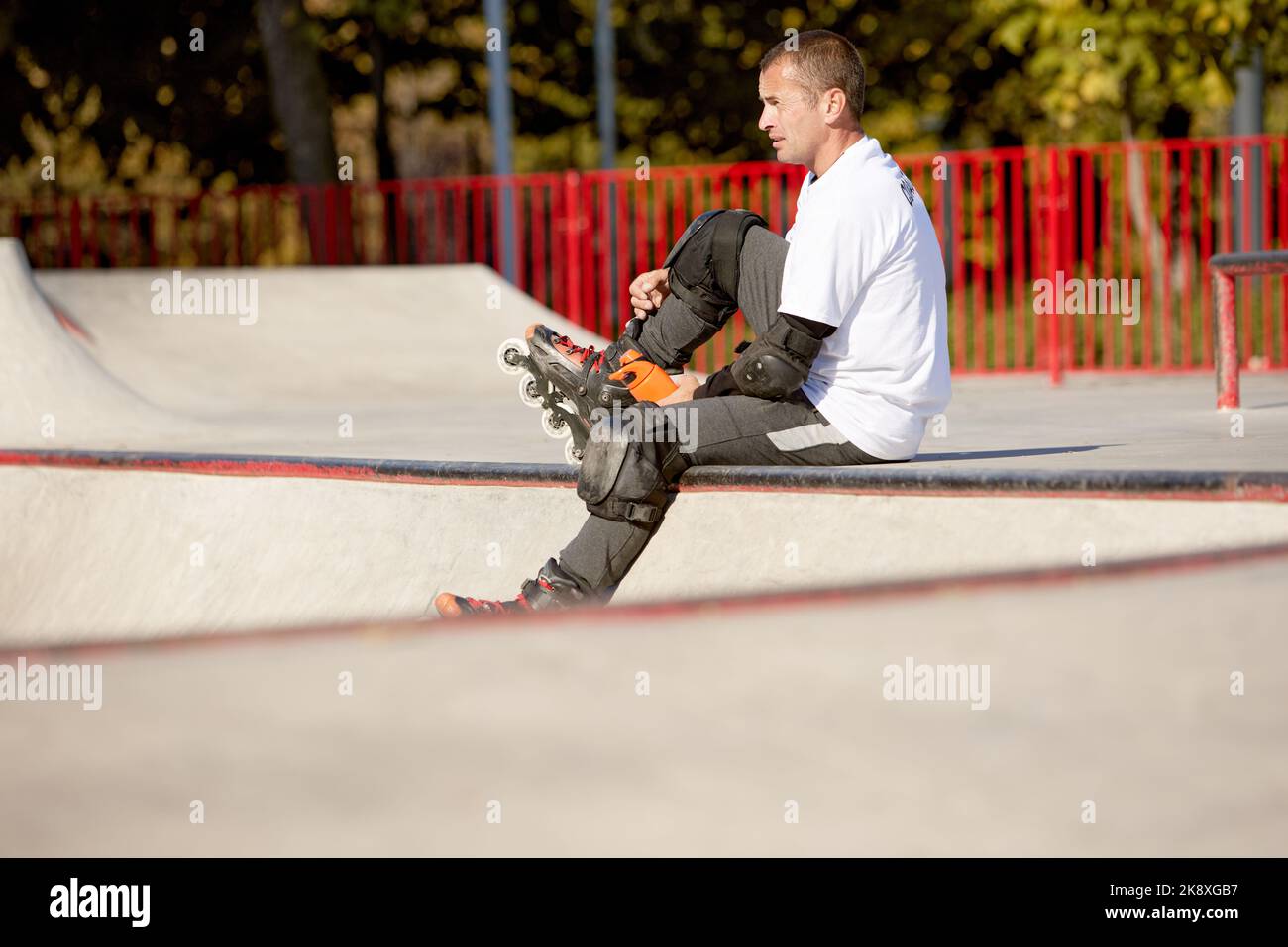 One man, male roller skater on rollerblades training at modern skate