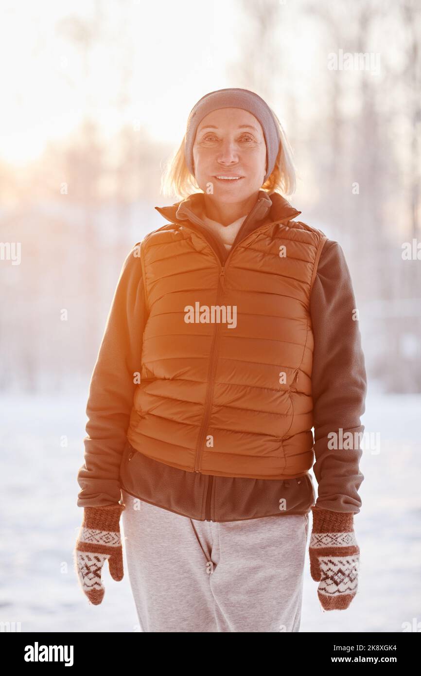 Senior woman sunset winter hi-res stock photography and images - Alamy