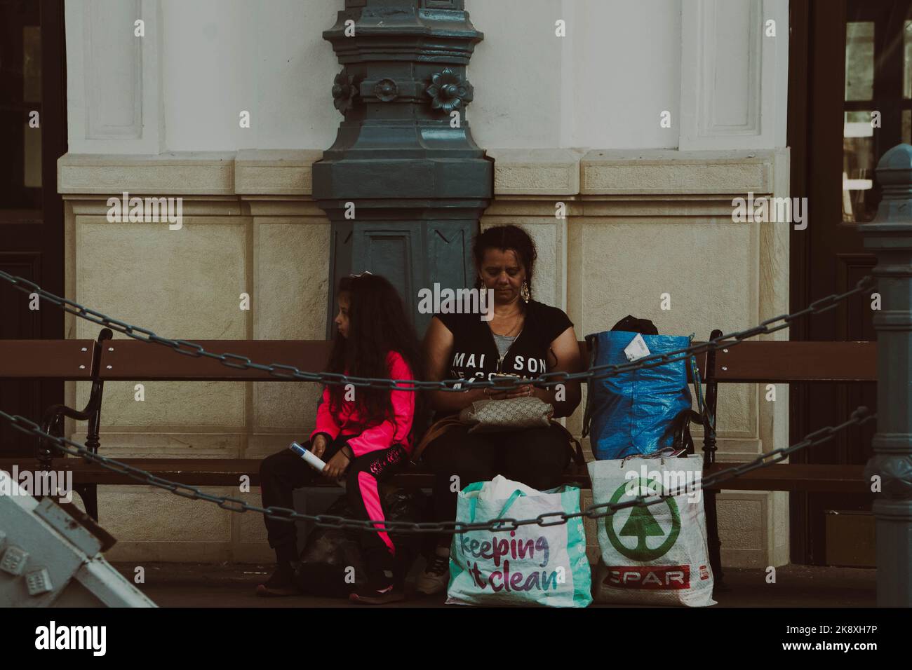 The Street Photography Of Budapest S Inner City With Mother And Daughter Sitting On The Bench