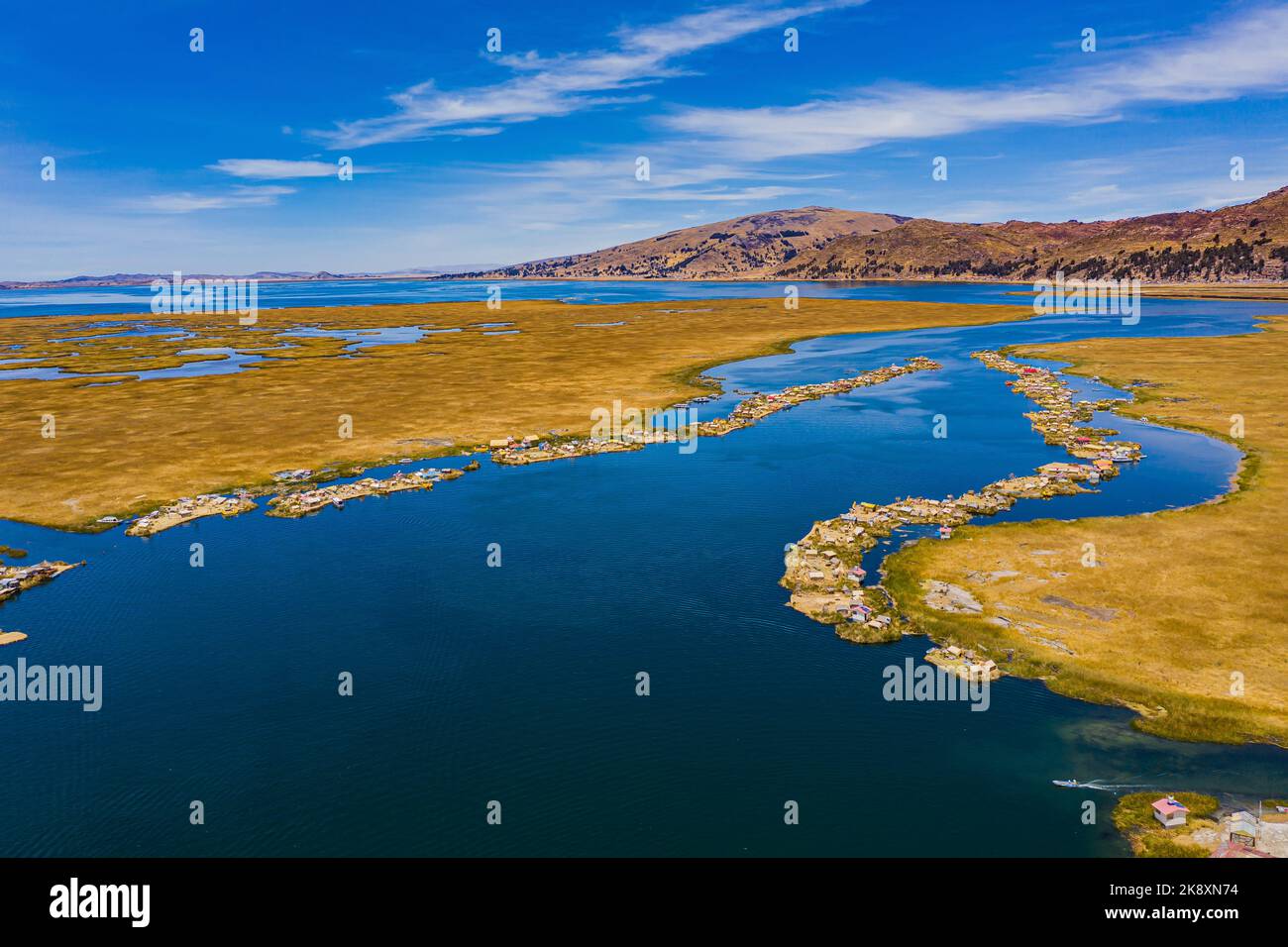 Aerial view of the Uros Straw Floating Islands on Lake Titicaca near Puno, Peru. Stock Photo