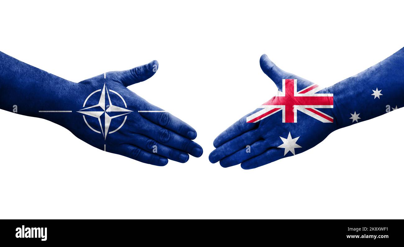 Handshake between Australia and Nato flags painted on hands, isolated transparent image Stock