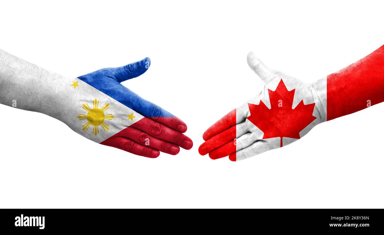 Handshake Between Canada And Philippines Flags Painted On Hands handshake-between-canada-and-philippines-flags-painted-on-hands