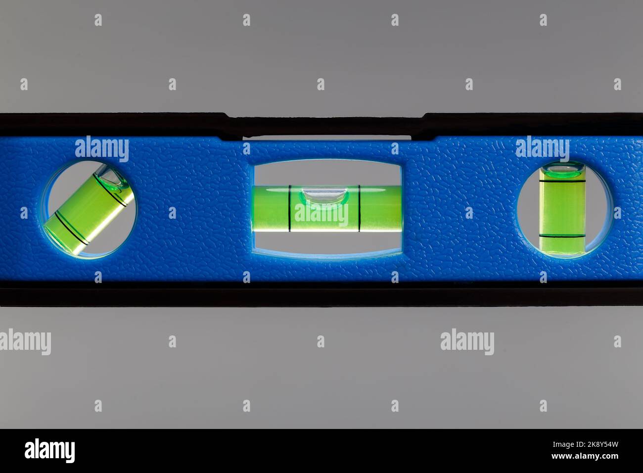 Bubble level with three elements located at different angles. Closeup