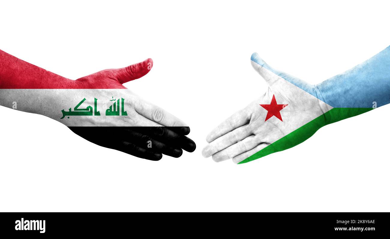Handshake between Djibouti and Iraq flags painted on hands, isolated transparent image. Stock Photo
