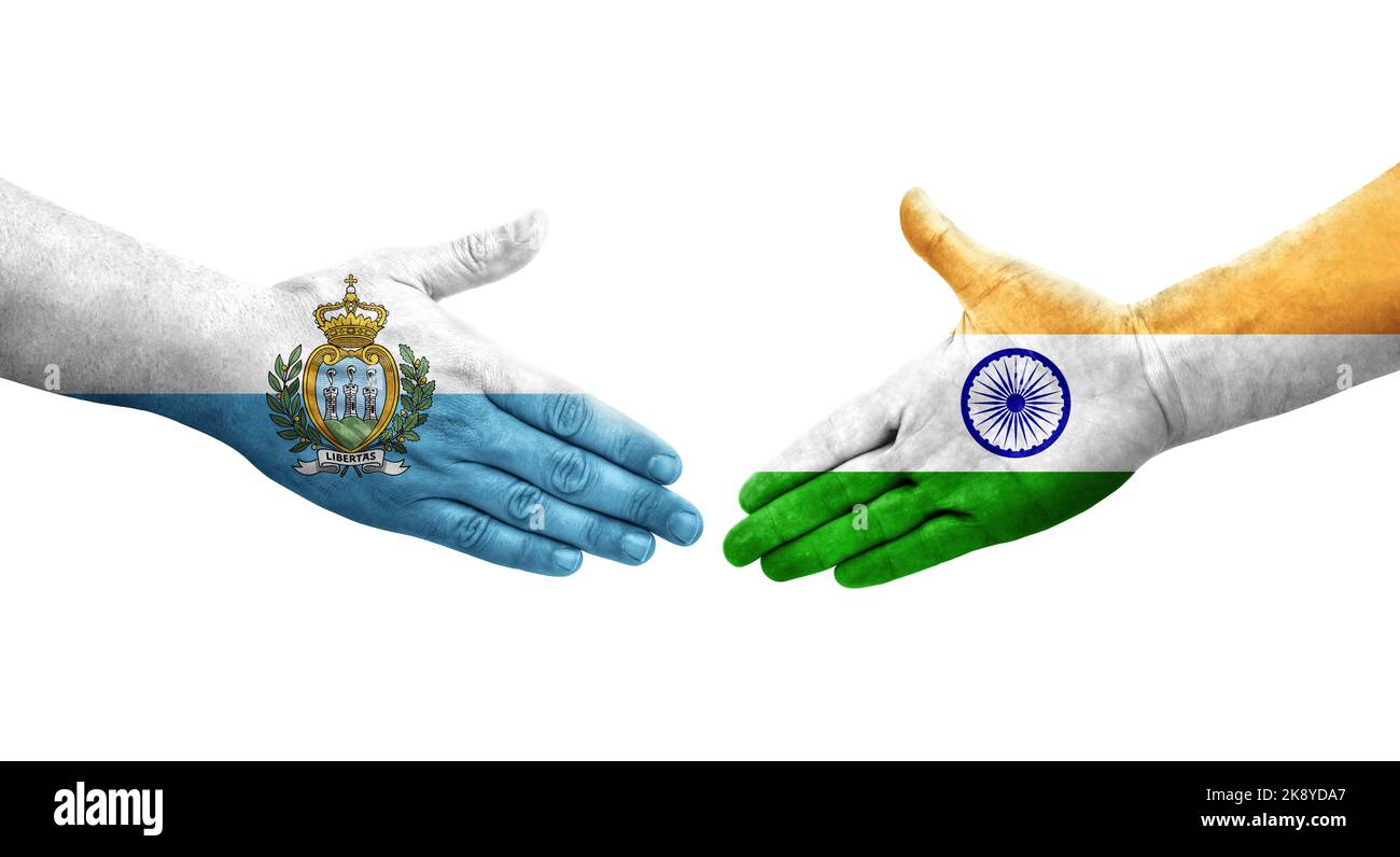 Handshake between India and San Marino flags painted on hands, isolated