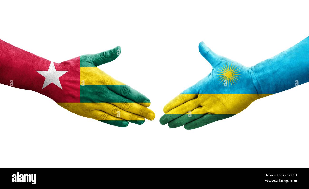 Handshake between Rwanda and Togo flags painted on hands, isolated ...