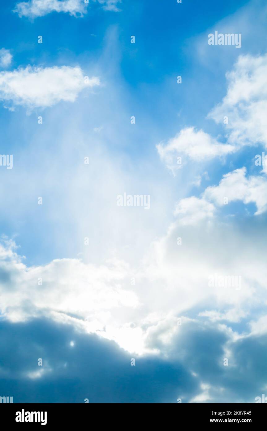 Blue sky background, dramatic blue sky landscape scene, beautiful sky scene with scenic white clouds Stock Photo