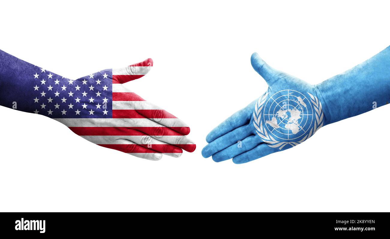 Handshake between United Nations and USA flags painted on hands