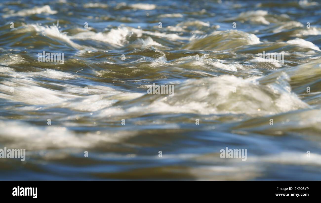 Streams of water beautifully flow down the Zambezi river. Long exposure for abstract flow. Livingston, Zambia, Africa Stock Photo