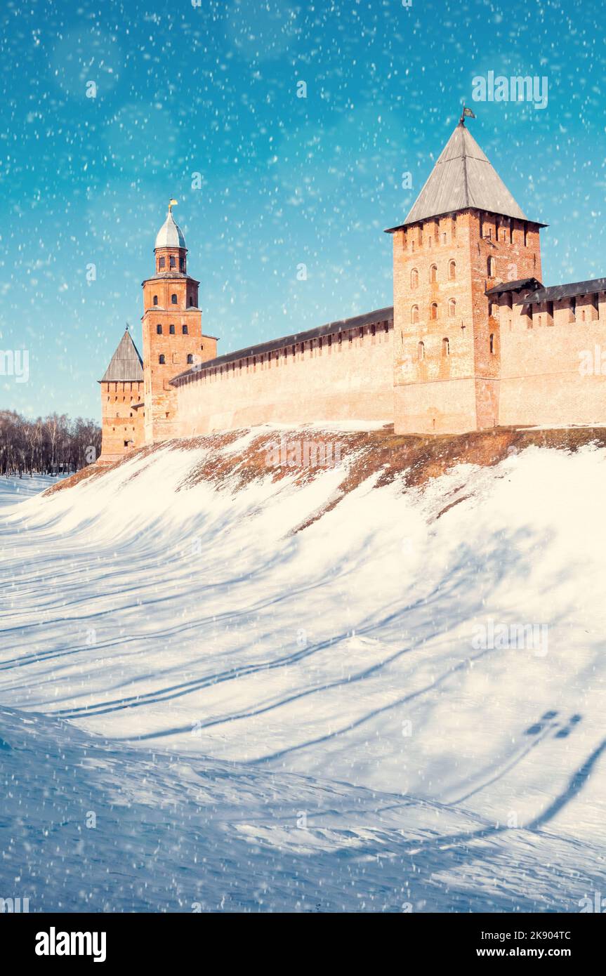 Veliky Novgorod Russia. Veliky Novgorod Kremlin fortress, winter sunny travel scene with snowfall. Focus at the Kremlin Stock Photo