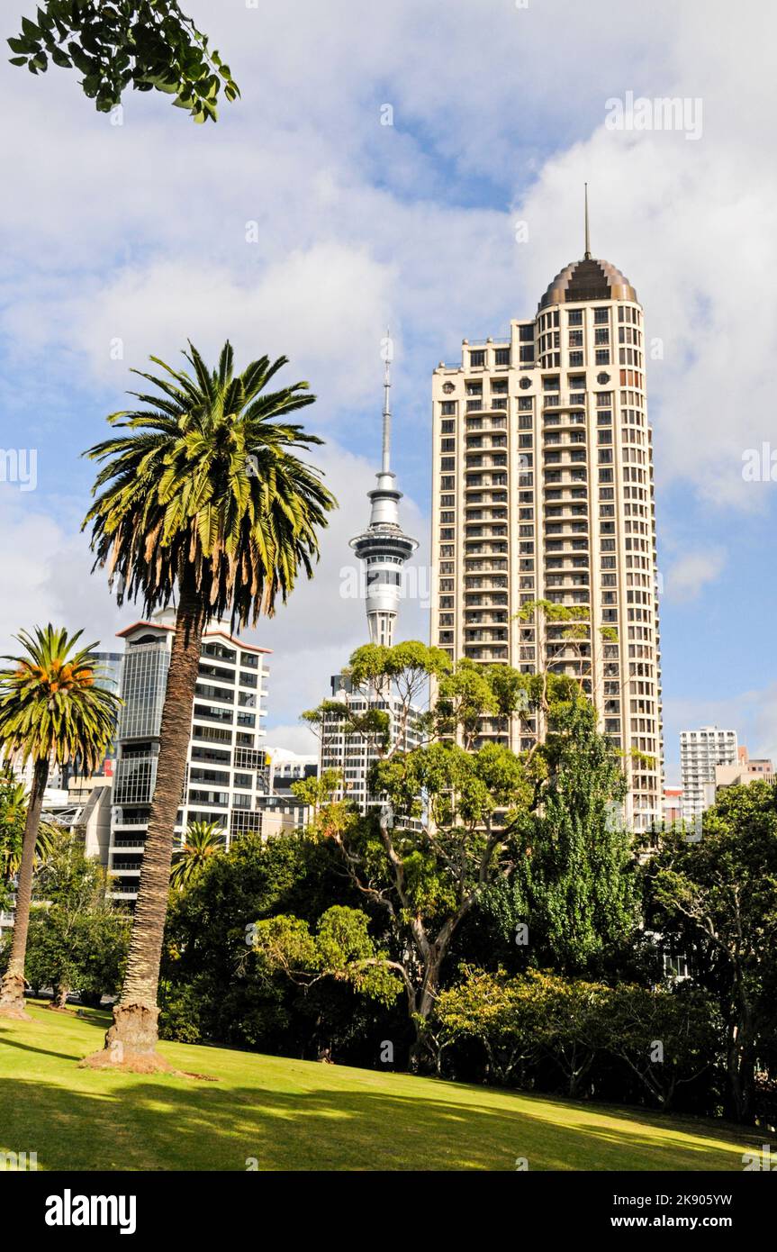 The Sky Tower and the city business district of Auckland from Albert Park in in New Zealand Stock Photo