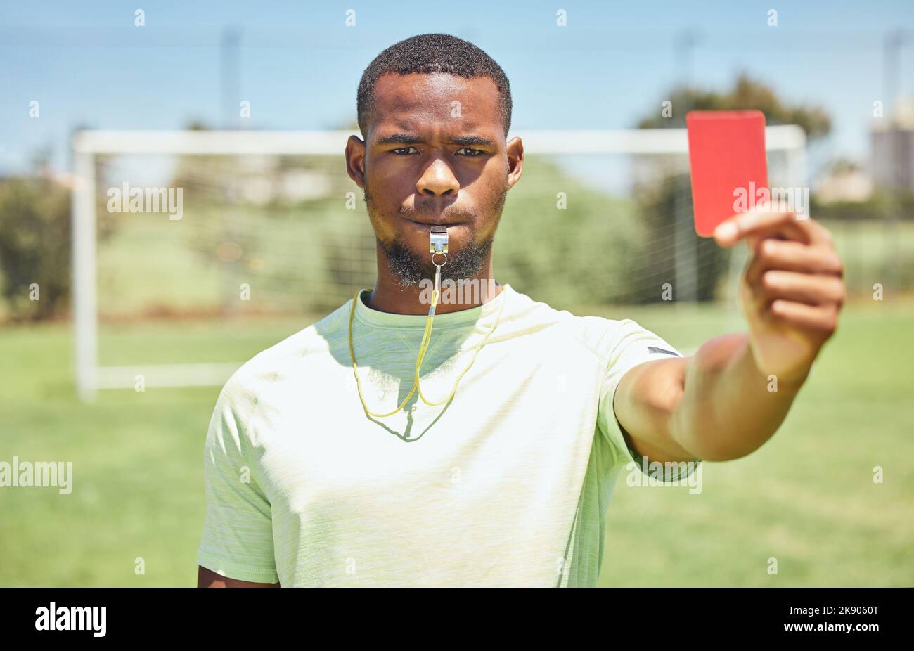 Red card, soccer referee and whistle for warning, decision and wrong