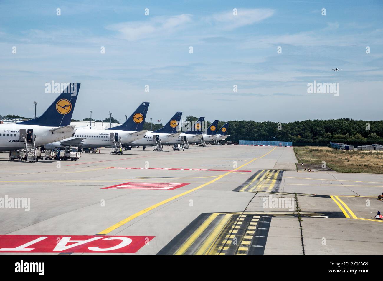 FRANKFURT, GERMANY JULY 12, 2015 row of Lufthansa flight with position at the apron due to
