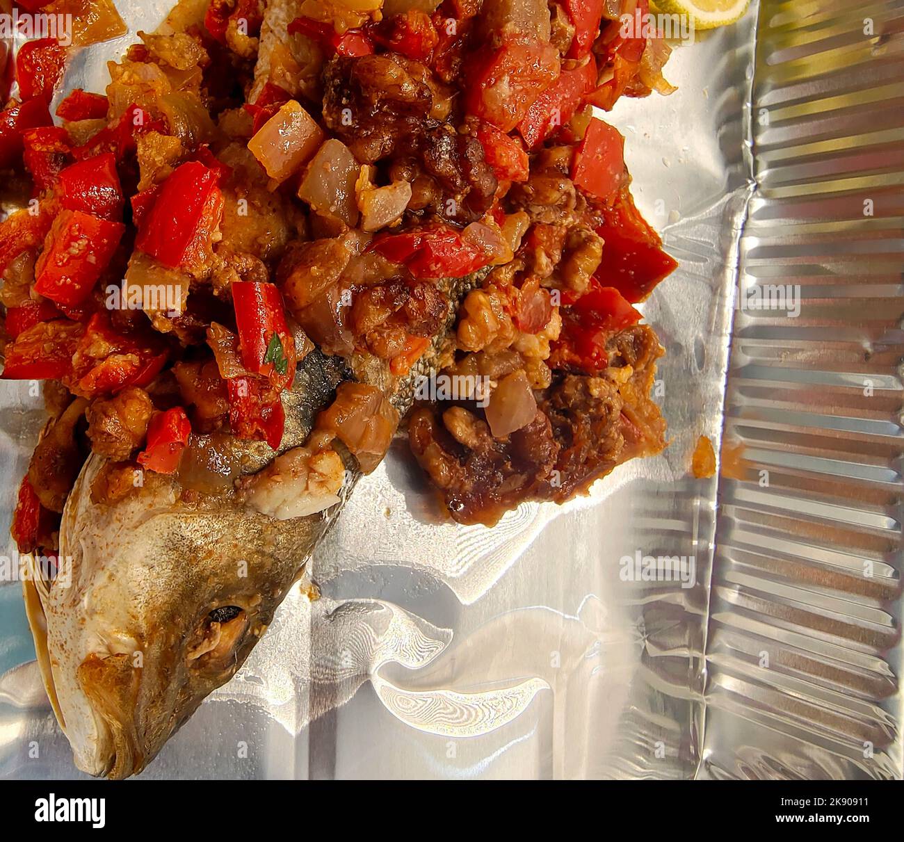 Baked sea bass with roasted vegetables Stock Photo Alamy