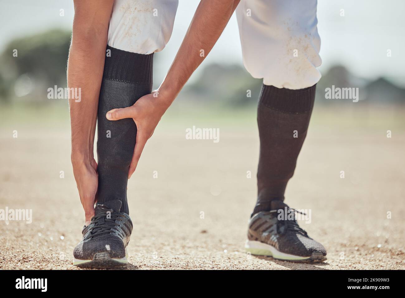 Sports, field and man with ankle injury after game, competition or