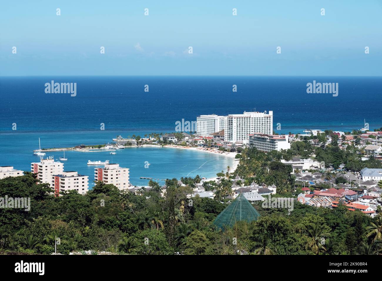 An aerial view of the sunny shore of Ocho Rios with residential