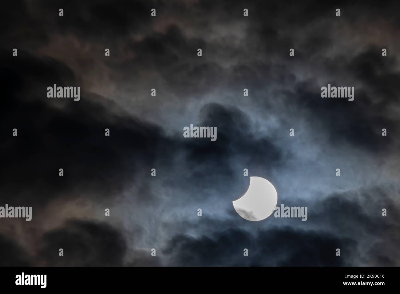 Partial solar eclipse of October 25, 2022, seen from Pisa, Italy Stock Photo